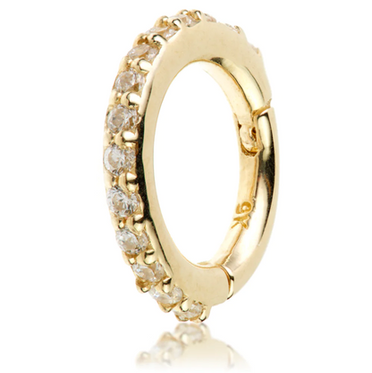 9ct Gold Pavé Gem Eternity Hinge Ring featuring a delicate band adorned with sparkling gemstones, perfect for adding elegance and shine to any outfit. Ideal for everyday wear or special occasions