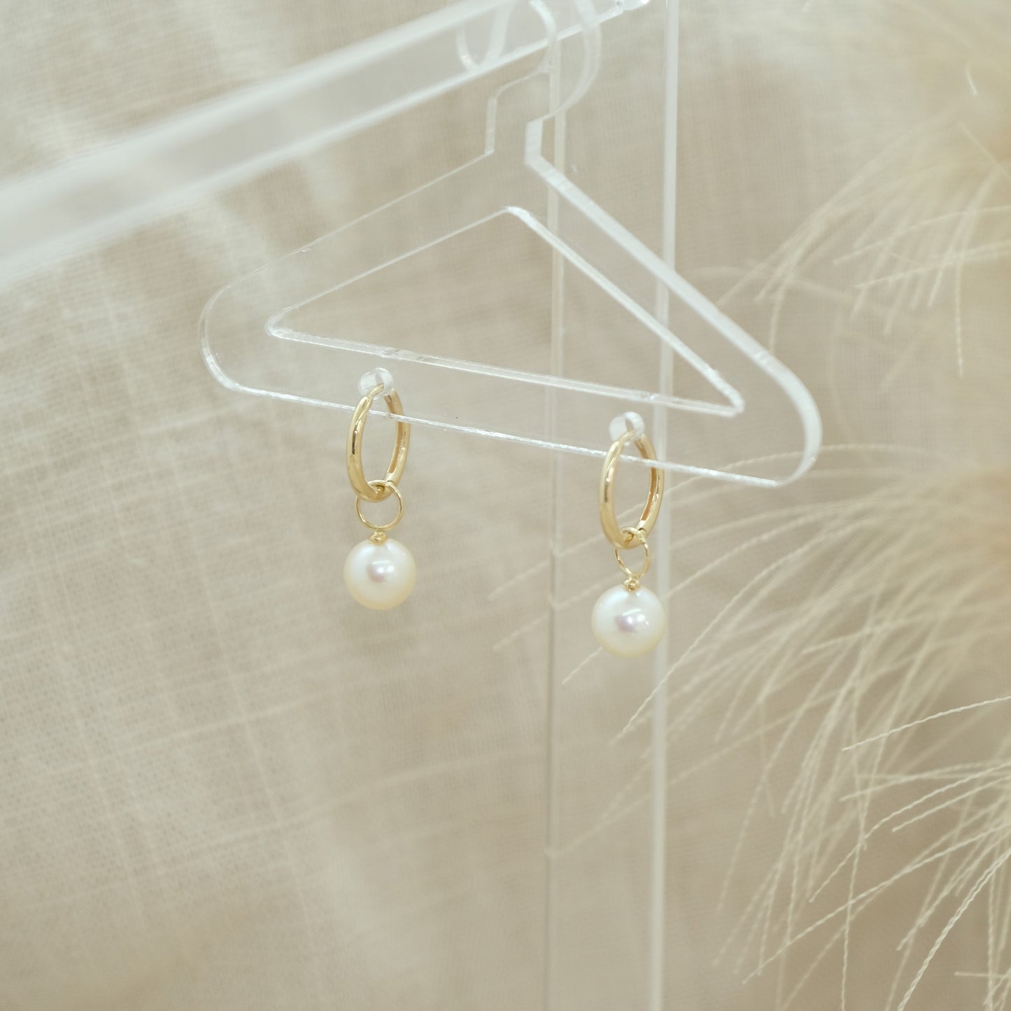 14ct Pearl Earring Charm from Ella Ray Jewellery: Sophisticated charm crafted from 14ct gold, featuring a lustrous pearl, perfect for adding timeless elegance and a touch of luxury to your earrings collection.