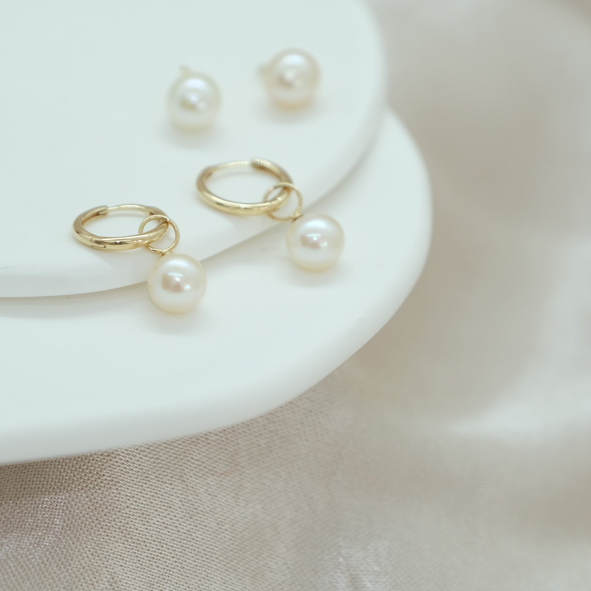 14ct Pearl Earring Charm from Ella Ray Jewellery: Sophisticated charm crafted from 14ct gold, featuring a lustrous pearl, perfect for adding timeless elegance and a touch of luxury to your earrings collection.