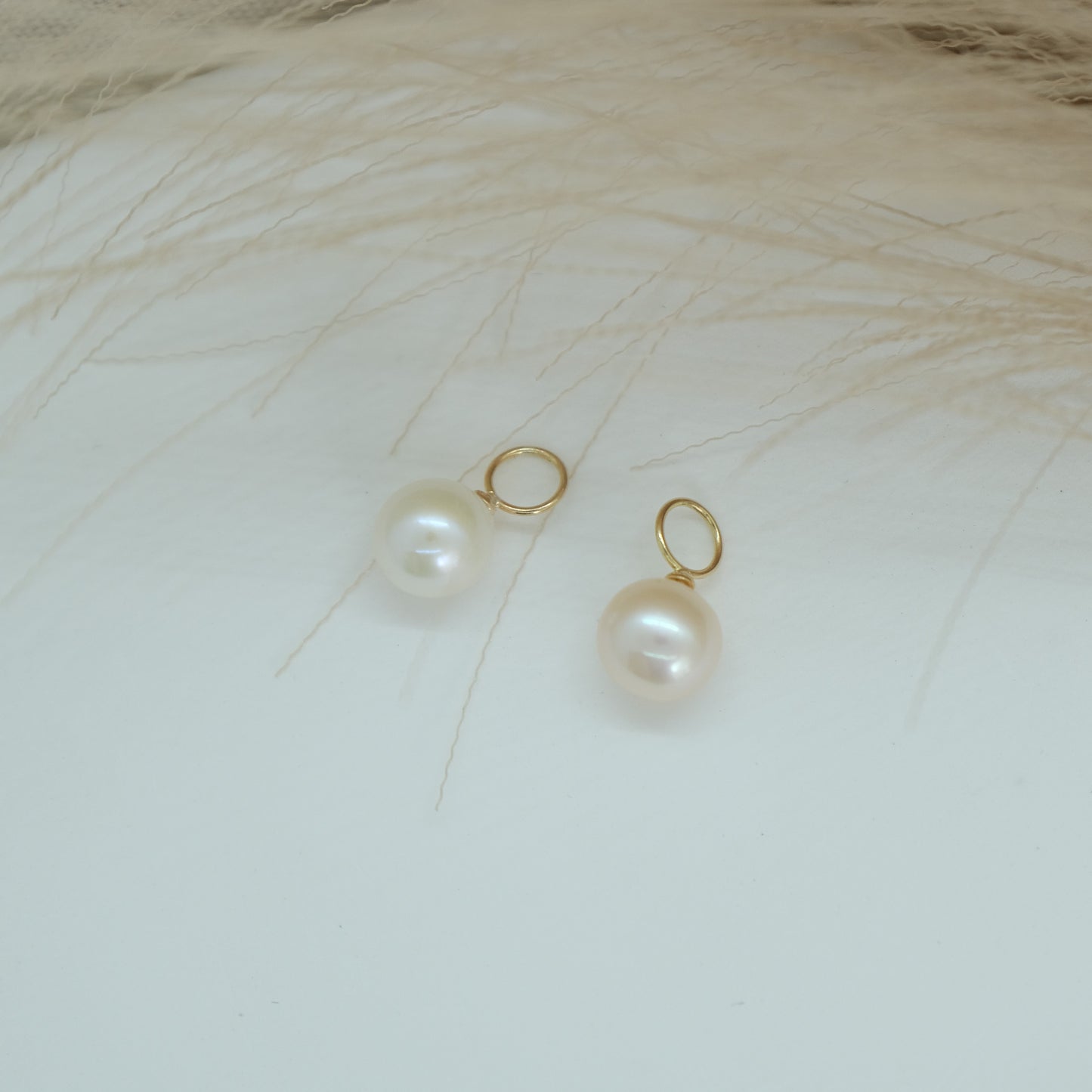 14ct Pearl Earring Charm from Ella Ray Jewellery: Sophisticated charm crafted from 14ct gold, featuring a lustrous pearl, perfect for adding timeless elegance and a touch of luxury to your earrings collection.