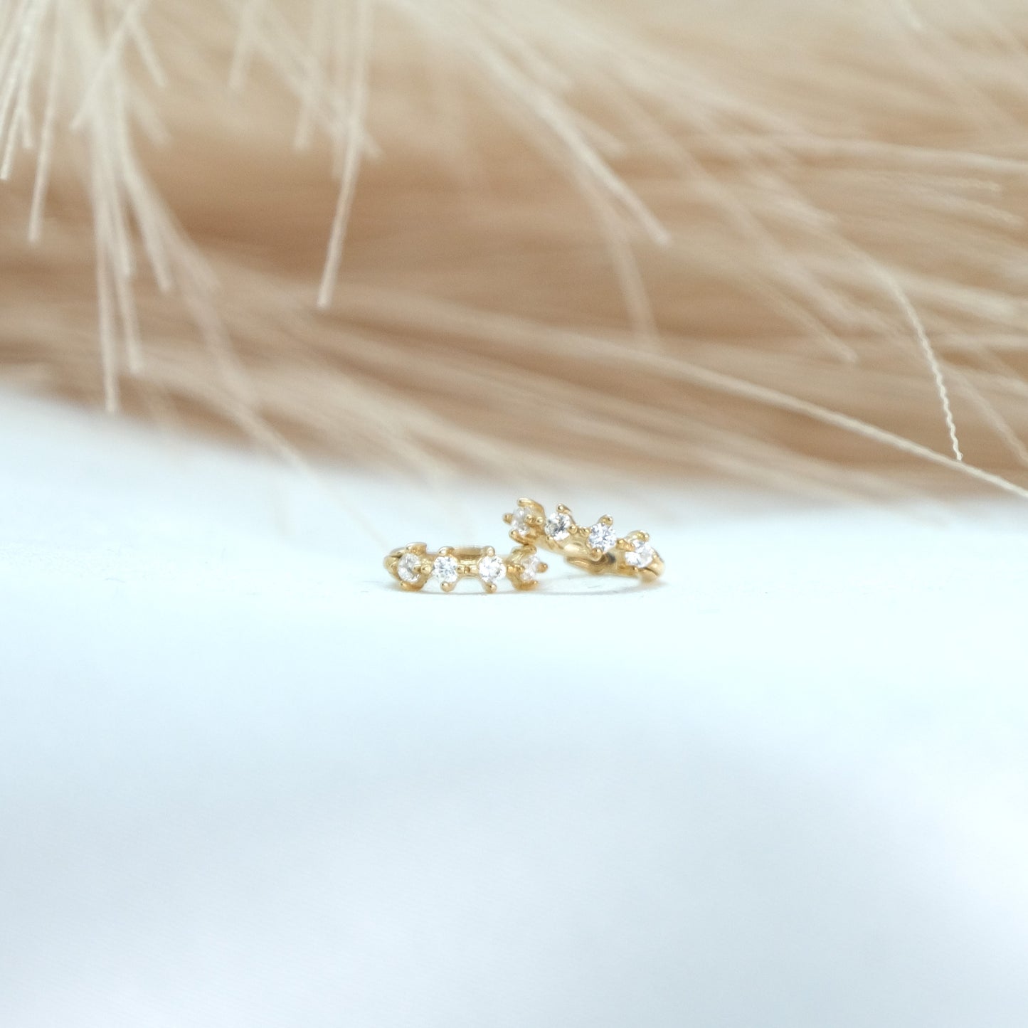 9ct Tiny Gem Yellow Gold Huggies featuring delicate gemstones in 9ct gold, available at Ella Ray Jewellery